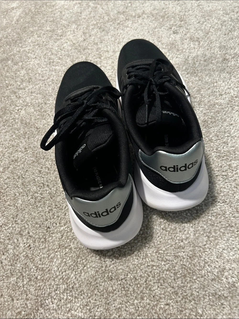 women’s adidas Black Athletic Sneakers with White Sole